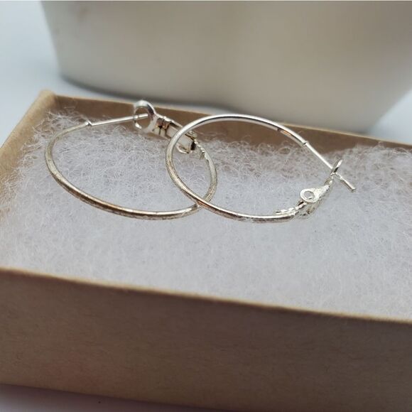 Delicate slender circle hoop silver toned earrings - Picture 2 of 4